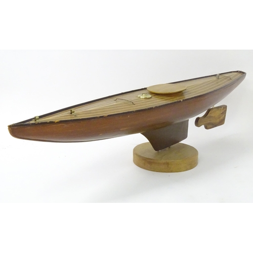 1323 - Toy: an early to mid 20thC model pond yacht / boat , carvel constructed from mahogany planks with bo... 