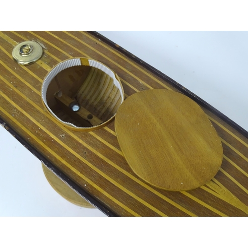 1323 - Toy: an early to mid 20thC model pond yacht / boat , carvel constructed from mahogany planks with bo... 