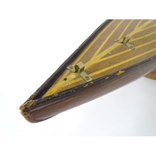 1323 - Toy: an early to mid 20thC model pond yacht / boat , carvel constructed from mahogany planks with bo... 