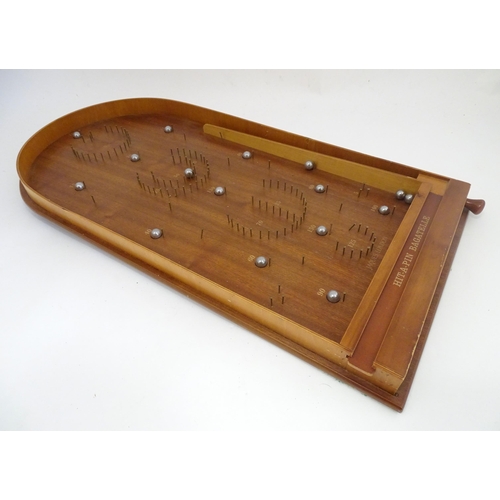 1325 - A mid to late 20thC Jacques London Hit a Pin Bagatelle pinball board. Approx. 30 1/2