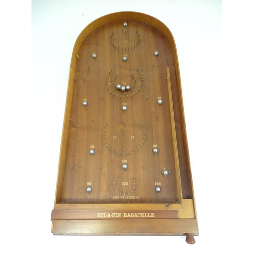 1325 - A mid to late 20thC Jacques London Hit a Pin Bagatelle pinball board. Approx. 30 1/2