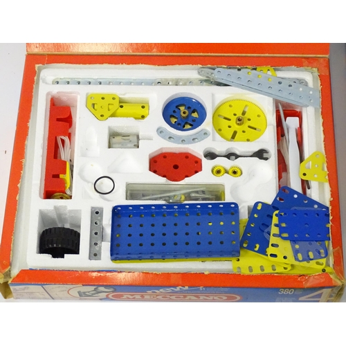 1327 - Toys: a large quantity of Meccano, to include cars, helicopter, various wheels, struts, panels etc. ... 