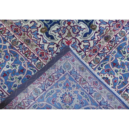 1385 - Carpet / Rug : An Isfahan carpet,  the blue ground with central medallion and floral and foliate det... 