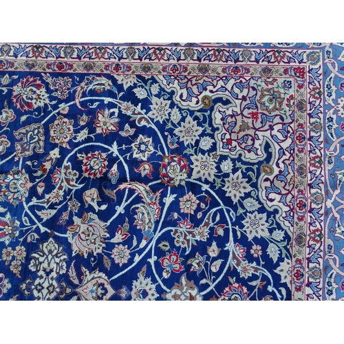 1385 - Carpet / Rug : An Isfahan carpet,  the blue ground with central medallion and floral and foliate det... 