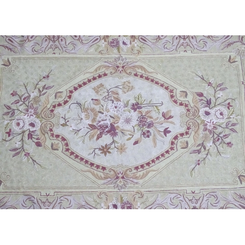 1392 - Carpets / Rugs :  Two Kashmiri rugs, one cream ground with beige, grey, green and pale pink floral a... 