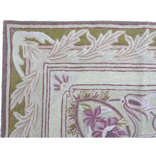 1392 - Carpets / Rugs :  Two Kashmiri rugs, one cream ground with beige, grey, green and pale pink floral a... 