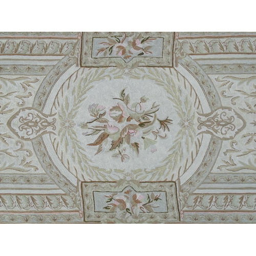 1392 - Carpets / Rugs :  Two Kashmiri rugs, one cream ground with beige, grey, green and pale pink floral a... 