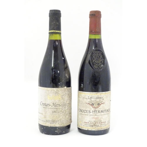 2149 - A bottle of Delas Freres Les Launes Crozes-Hermitage 1994 red wine, together with a bottle of Louis ... 