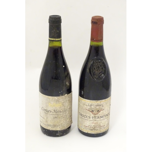 2149 - A bottle of Delas Freres Les Launes Crozes-Hermitage 1994 red wine, together with a bottle of Louis ... 