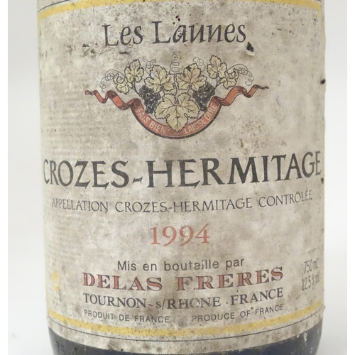 2149 - A bottle of Delas Freres Les Launes Crozes-Hermitage 1994 red wine, together with a bottle of Louis ... 