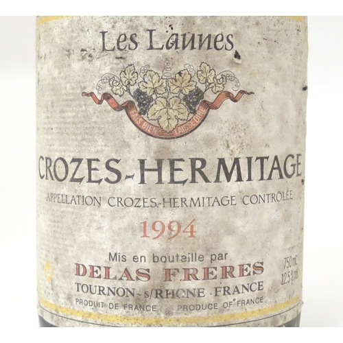 2149 - A bottle of Delas Freres Les Launes Crozes-Hermitage 1994 red wine, together with a bottle of Louis ... 