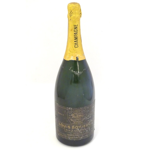 2156 - A magnum bottle of Louis Boyier & Cie champagne, 300cl