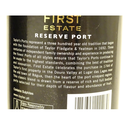 2158 - A 75cl bottle of Dow's Midnight port, together with a 75cl bottle of Taylors First Estate reserve po... 