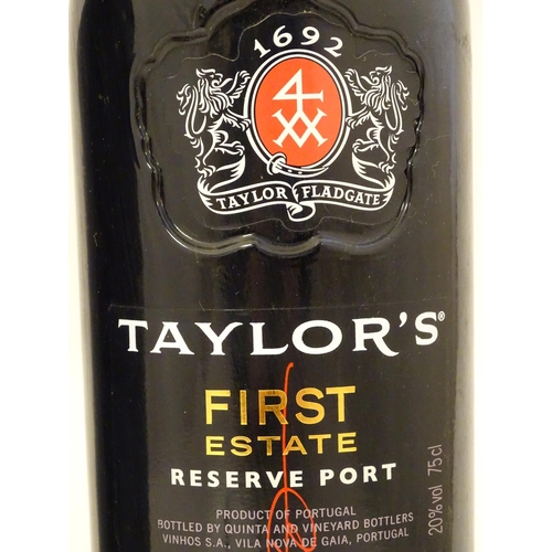 2158 - A 75cl bottle of Dow's Midnight port, together with a 75cl bottle of Taylors First Estate reserve po... 