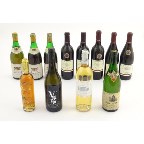 2166 - An assortment of white and red wine, including a 1979 Saint Ferdinand Jehan Le Bon Jurancon Sec 75cl... 