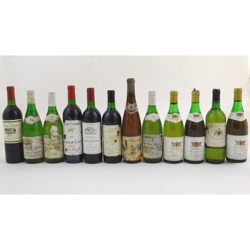 2170 - Twelve bottles of white and red wine, to include a Baron Philippe Mouton-Cadet Bordeaux 75cl and a L... 