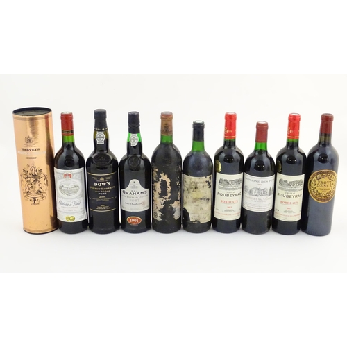 2171 - An assortment of wine, port and sherry, to include a W & J Graham's vintage port, a boxed bottle of ... 