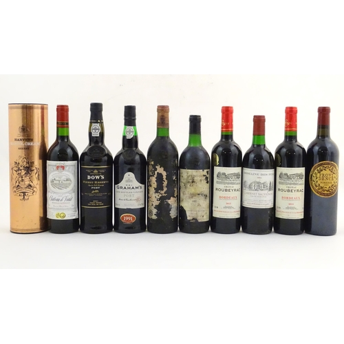 2171 - An assortment of wine, port and sherry, to include a W & J Graham's vintage port, a boxed bottle of ... 