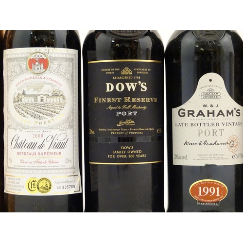 2171 - An assortment of wine, port and sherry, to include a W & J Graham's vintage port, a boxed bottle of ... 