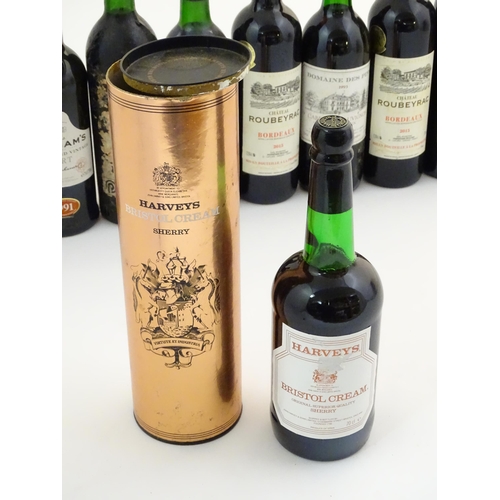 2171 - An assortment of wine, port and sherry, to include a W & J Graham's vintage port, a boxed bottle of ... 