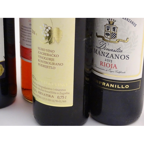 2173 - Twenty bottles of red and white wine, including a Corelli chianti 75cl, a Carlos Minairo Tempranillo... 