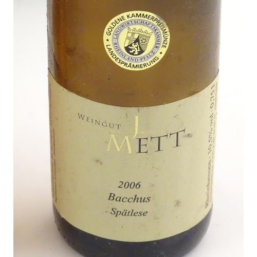 2175 - An assortment of red and white wines, to include a J Mett 2022 Bacchus Lieblich 2002 75cl and a Tren... 