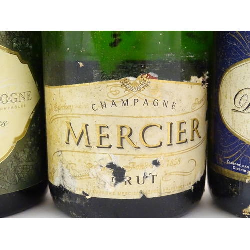 2179 - Nine bottles of Champagne, to include Dubois-Caron 75cl, Mercier 75cl and Cremant de Bourgogne 75cl ... 