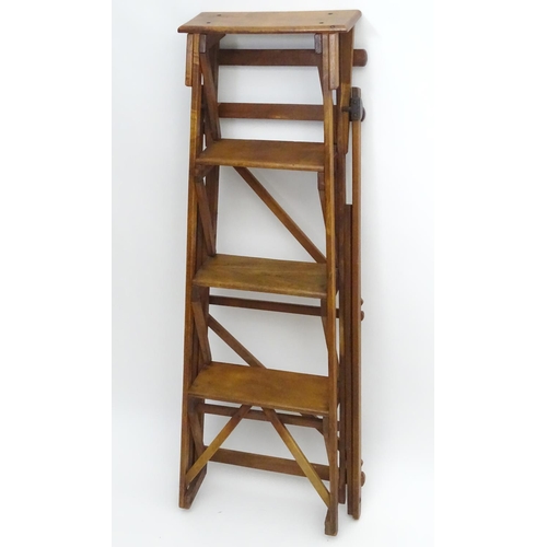 1357 - An early 20thC library step ladder, constructed from beech and ash with four steps, 14