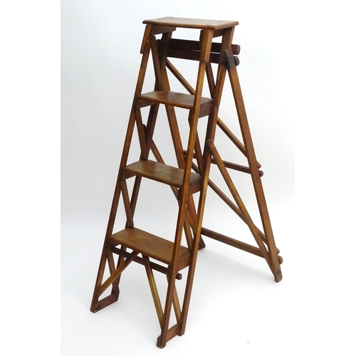 1357 - An early 20thC library step ladder, constructed from beech and ash with four steps, 14