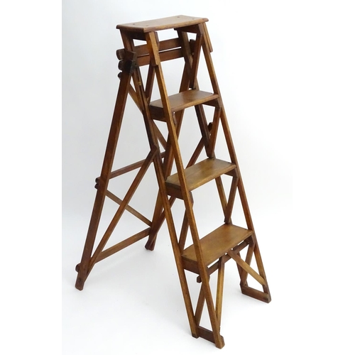 1357 - An early 20thC library step ladder, constructed from beech and ash with four steps, 14