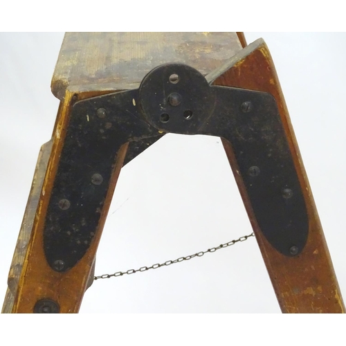 1358 - A mid 20thC combination step / straight ladder, marked The Handy 2 in 1 Ladder, constructed from spr... 