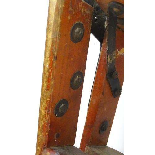 1358 - A mid 20thC combination step / straight ladder, marked The Handy 2 in 1 Ladder, constructed from spr... 