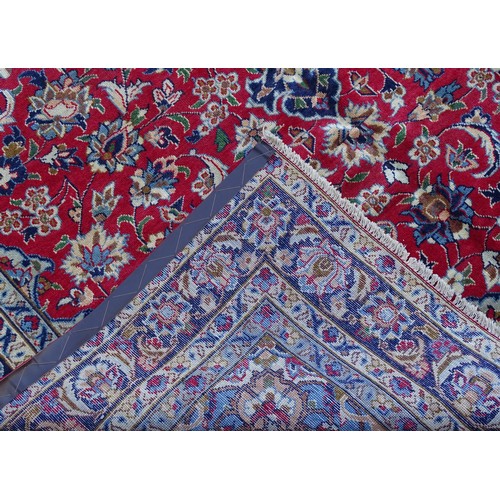 1381 - Carpet / Rug : An Isfahan carpet, the red ground with central medallion and floral and foliate detai... 