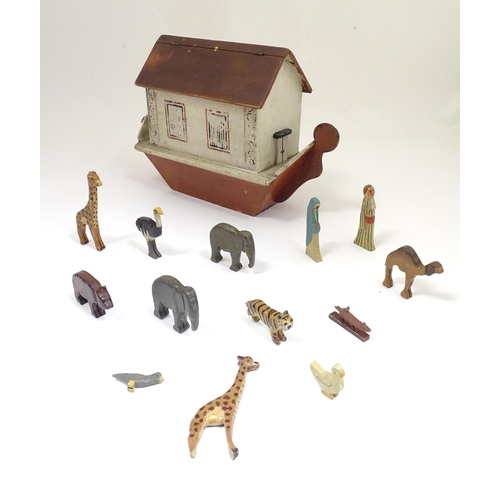 1314 - Toy: An early to mid 20thC hand made and hand painted model of Noah's Ark containing various carved ... 