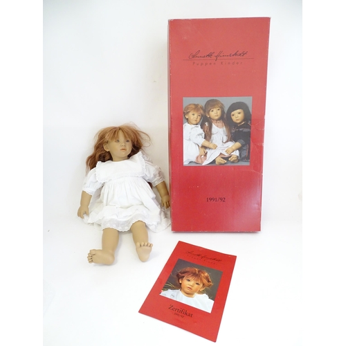 1317 - Toy: a boxed Annette Himstedt Puppen Kinder 1991/92 Liliane doll, with certificate, approximately 26... 