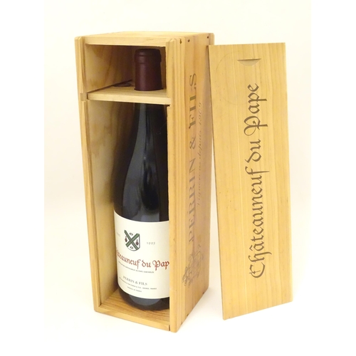 2161 - A boxed magnum bottle of Perrin & Fils Chateauneuf du Pape 1995 red wine, 150cl