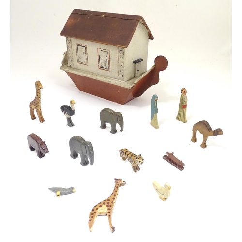 1314 - Toy: An early to mid 20thC hand made and hand painted model of Noah's Ark containing various carved ... 