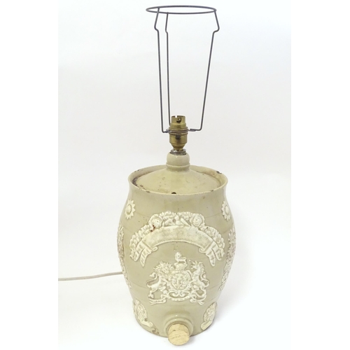 1349 - A 19thC stoneware rum ration barrel / flagon converted to a table lamp, the base of ovoid form and d... 