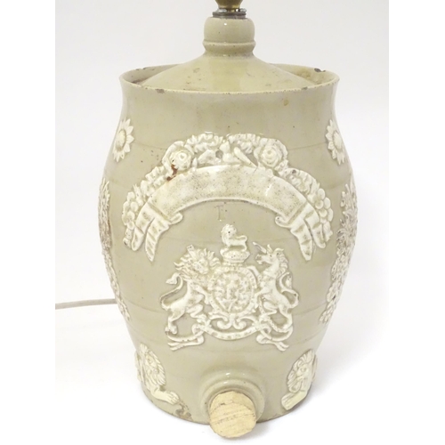 1349 - A 19thC stoneware rum ration barrel / flagon converted to a table lamp, the base of ovoid form and d... 