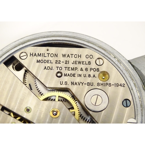 1401 - A Hamilton U.S. Navy Model 22 forty-eight hour metal cased chronometer deck watch. c.1942 The dial s... 