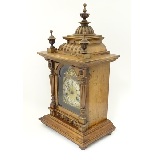 1397 - A Hamburg American Clock Co. mantel / bracket clock with silvered chapter ring, striking on a gong c... 