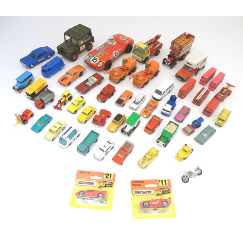 1312 - Toys: a quantity of assorted 20thC scale model cars / vehicles, the larger examples comprising a Tri... 