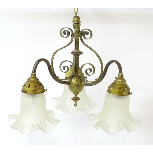 1336 - An early 20thC pendant three branch ceiling light , the brass mount with scroll decoration, stamped ... 