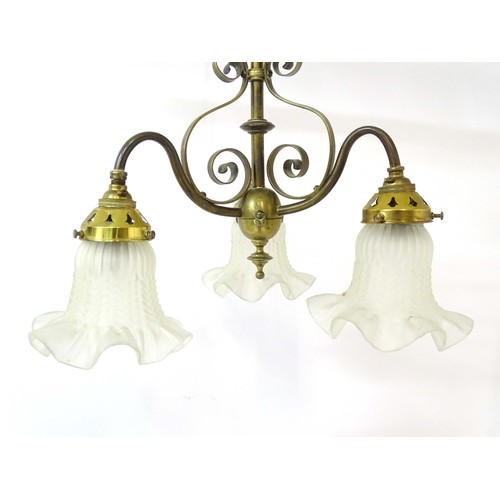 1336 - An early 20thC pendant three branch ceiling light , the brass mount with scroll decoration, stamped ... 