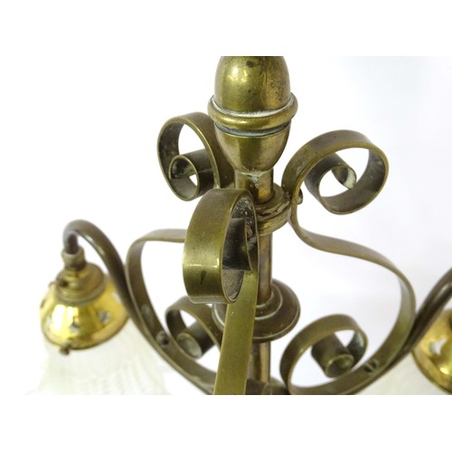 1336 - An early 20thC pendant three branch ceiling light , the brass mount with scroll decoration, stamped ... 