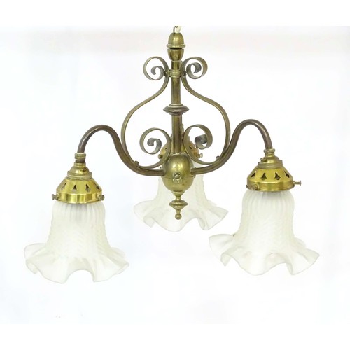 1336 - An early 20thC pendant three branch ceiling light , the brass mount with scroll decoration, stamped ... 