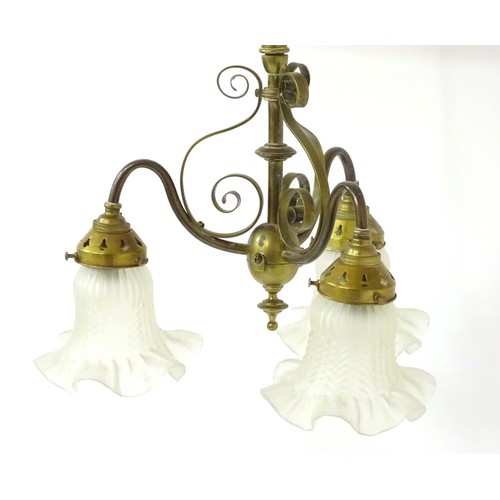 1336 - An early 20thC pendant three branch ceiling light , the brass mount with scroll decoration, stamped ... 