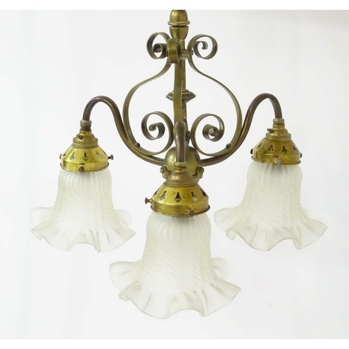 1336 - An early 20thC pendant three branch ceiling light , the brass mount with scroll decoration, stamped ... 