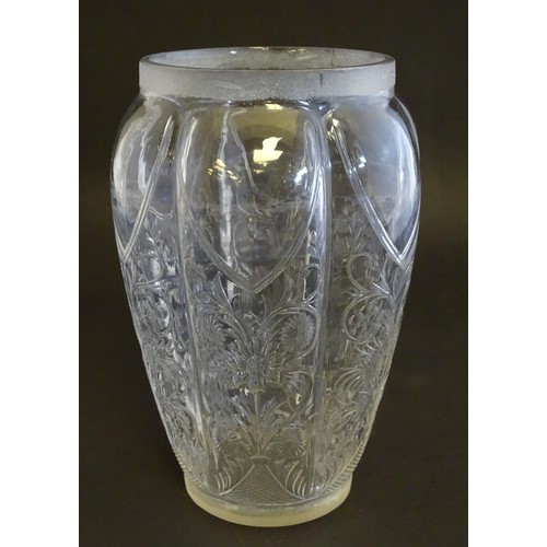 151 - A rock crystal vase of lobed baluster form with cut floral decoration with associated silver mounts ... 