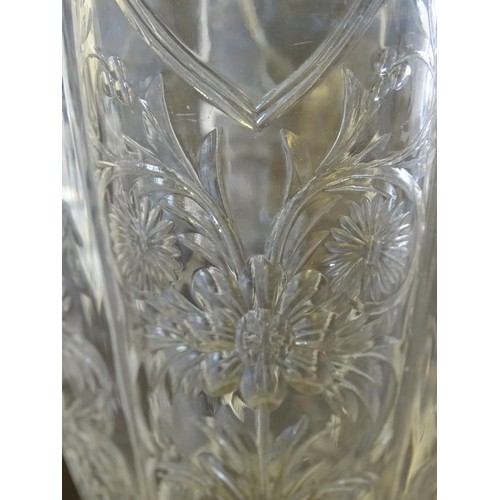 151 - A rock crystal vase of lobed baluster form with cut floral decoration with associated silver mounts ... 